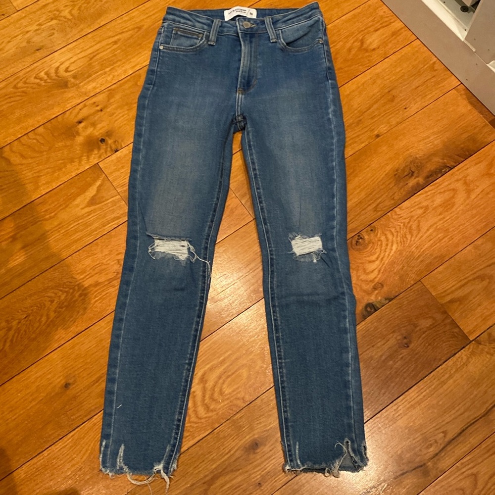 Just Black Denim skinny with destruction.  Size 25